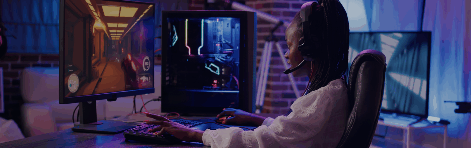 woman playing video games on computer